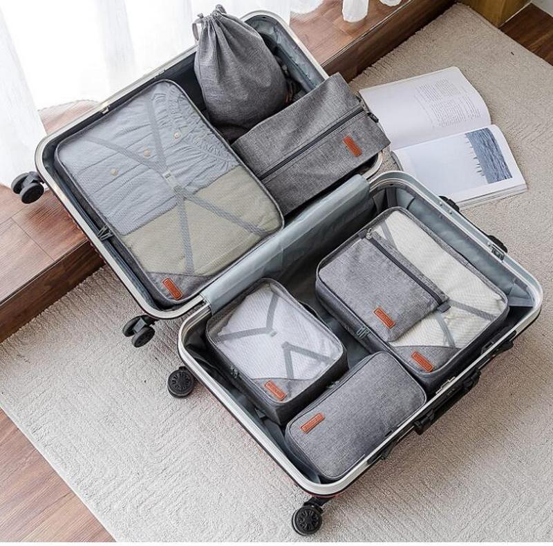 Juego de cubos de embalaje de equipaje de viaje de calidad al por mayor de 7 bolsas de viaje de compresión impermeables Unisex personalizadas