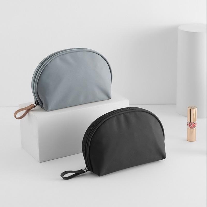 Nuevo diseño de bolsas de aseo con bolsa de maquillaje cosmético de viaje con forma de concha