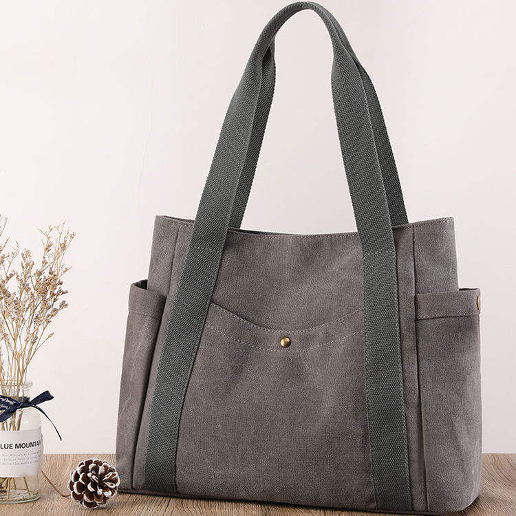 Fabricante de China, bolsos de mano con logotipo personalizado de lona de algodón para mujer, bolso de compras ecológico para el trabajo escolar de ocio