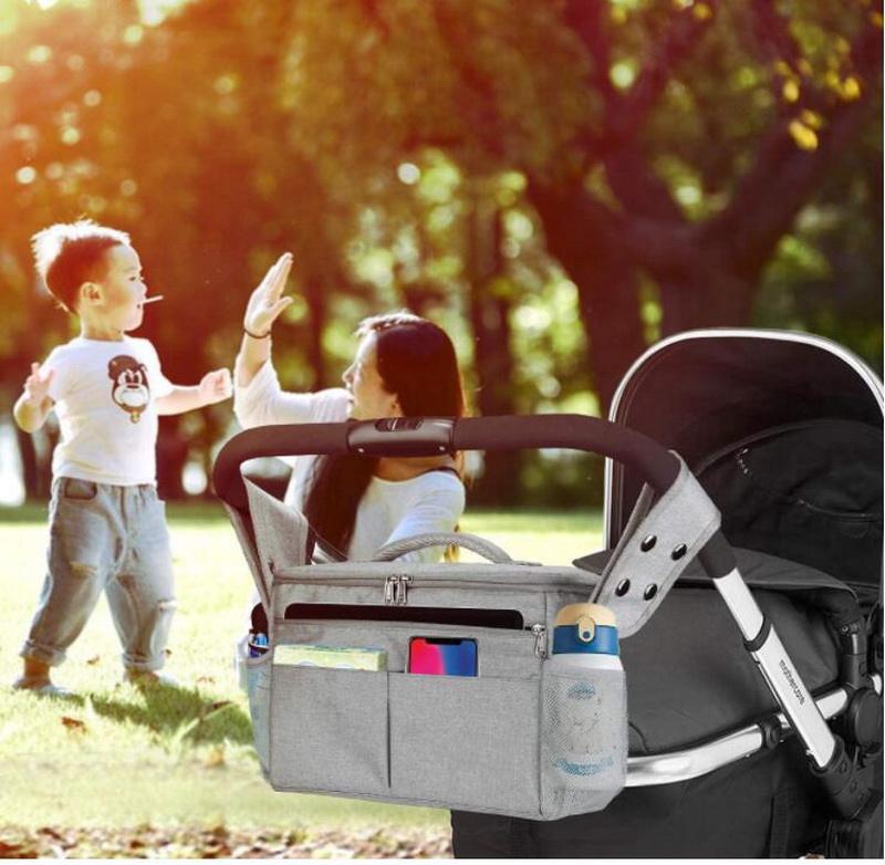 Bolsas organizadoras de cochecito de bebé aisladas impermeables de viaje personalizadas de gran capacidad bolsa de almacenamiento de pañales con correa ajustable